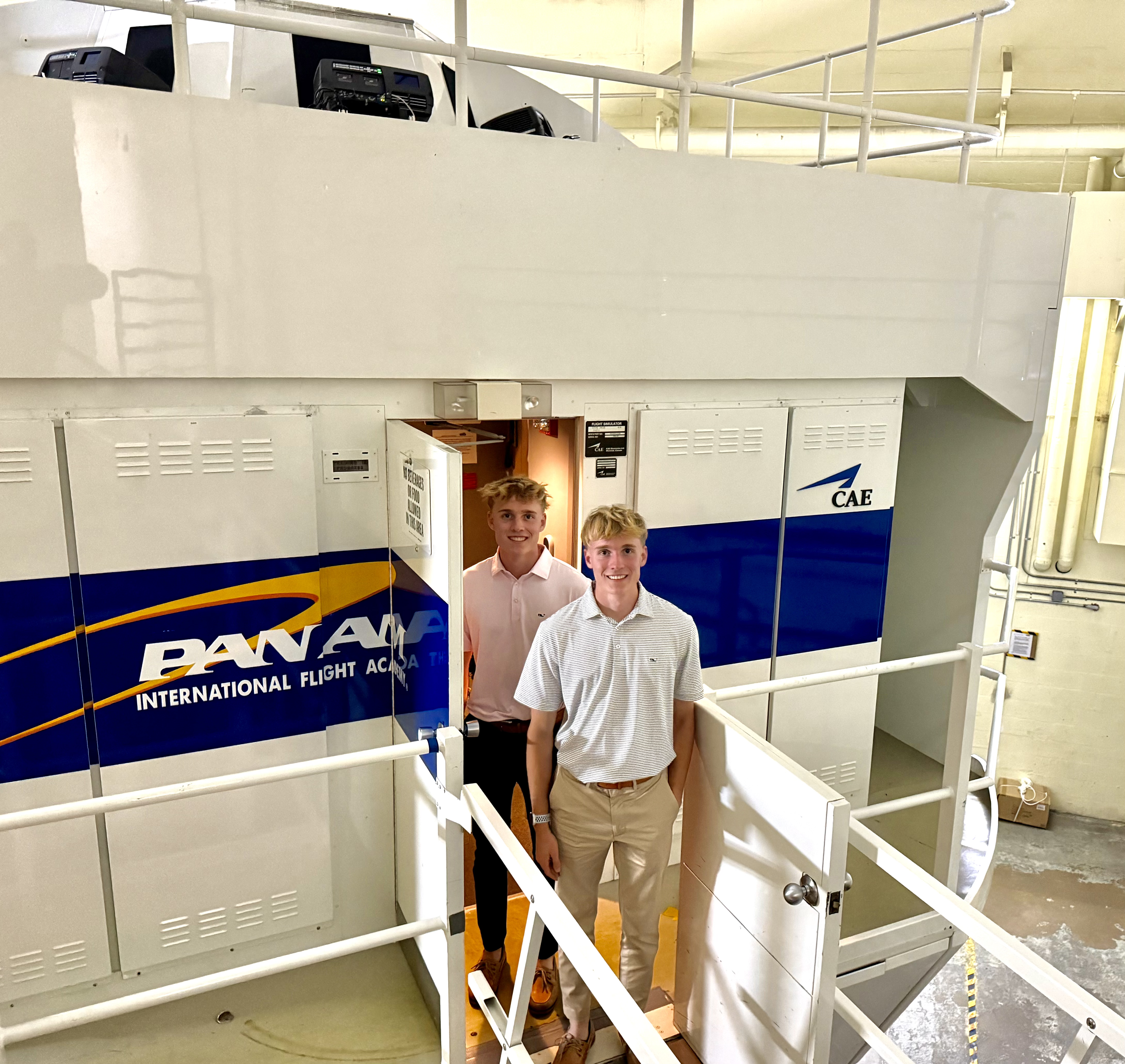 Landen & Logan outside the Saab 340 Simulator
