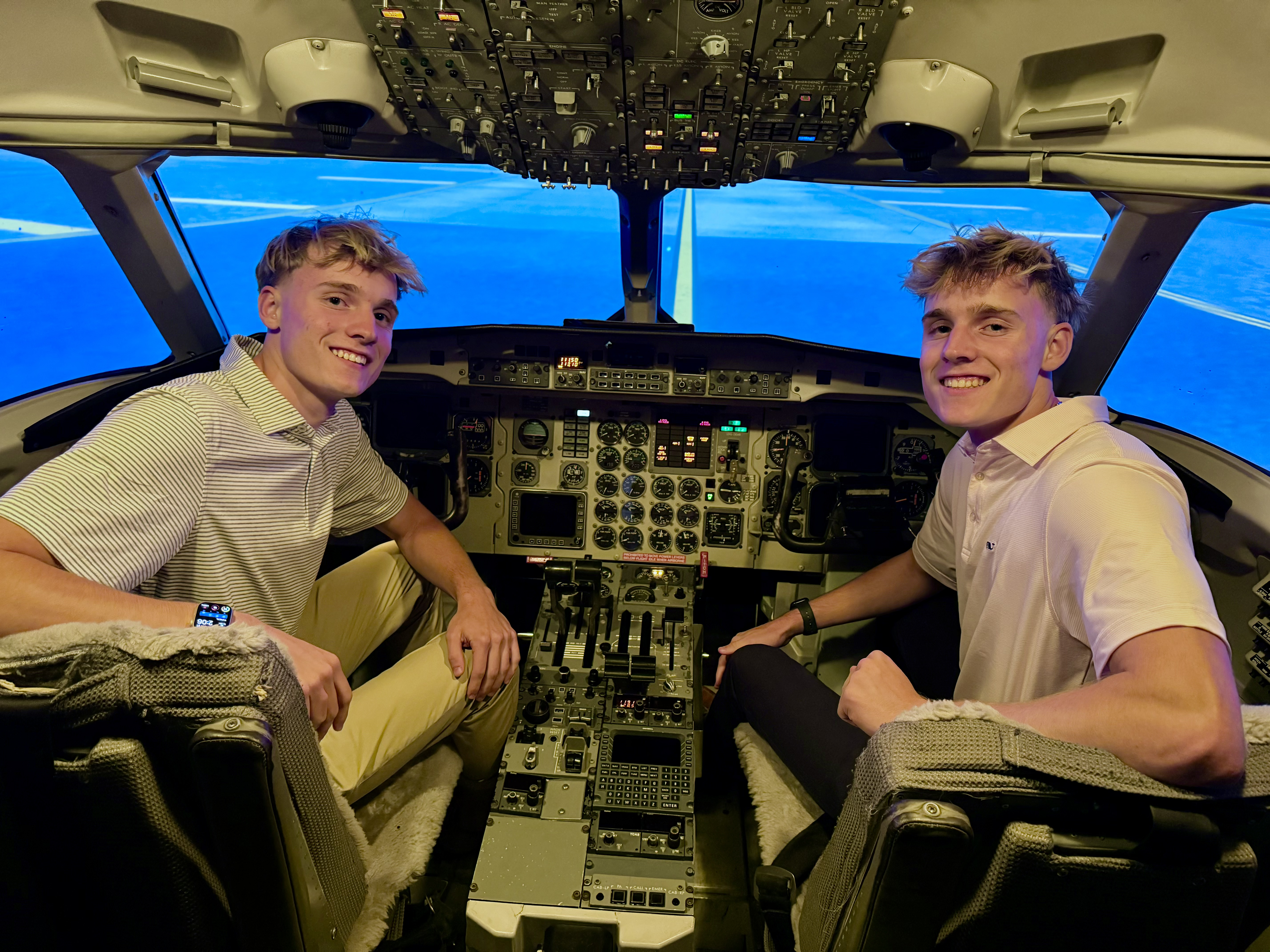 Landen and Logan Schapker in Saab 340 Full Motion Simulator
